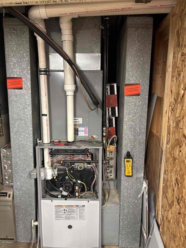 Responded to no heat complaint at commercial property and diagnosed failed gas valve and faulty flame sensor. Performed diagnostic testing using multimeter on furnace with front panel removed. Provided customer with replacement options due to non-repairable condition of critical components.
