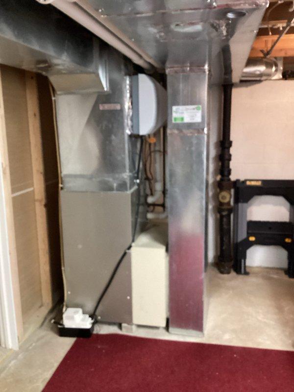 Responded to after-hours no heat call for new customer. Diagnostic inspection revealed failed heat exchanger in aging furnace (10+ years old). Due to safety concerns and age of equipment, recommended replacement. Installed new unit to restore heating function. Documented condition with photos showing original installation and heat exchanger damage.