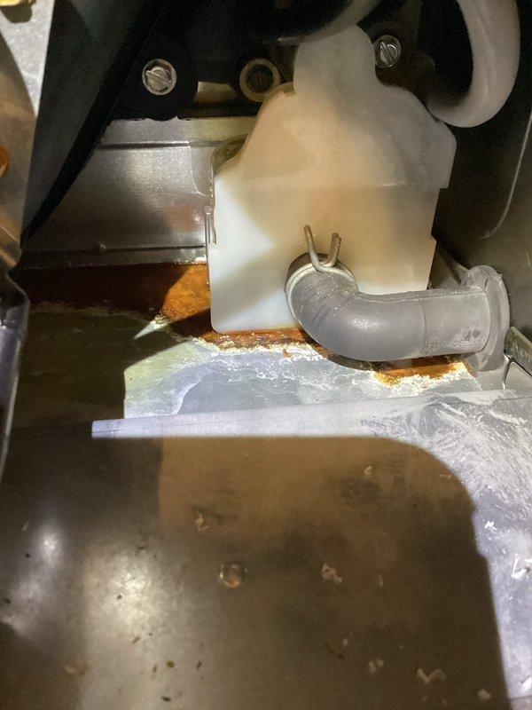 Performed annual maintenance on furnace under CCC Quality Plan agreement. Conducted regular cleaning of system components. Identified and repaired leaking drain trap by replacing deteriorated gray gasket with new green gasket.