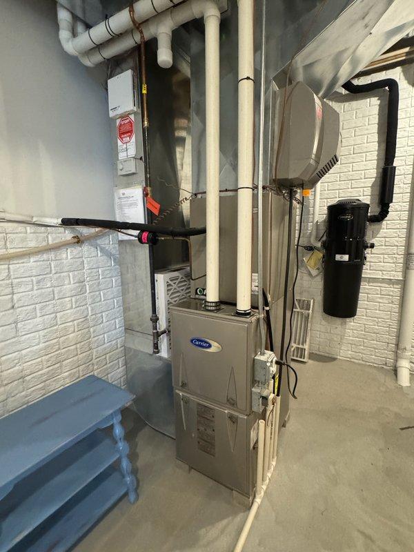 Performed fall preventative maintenance on Carrier furnace system recently acquired by customer. Completed full tune-up service, including system inspection of furnace components, associated ductwork, and humidifier/air treatment unit. Identified and replaced dirty air filter to ensure proper system operation and efficiency for the upcoming heating season.