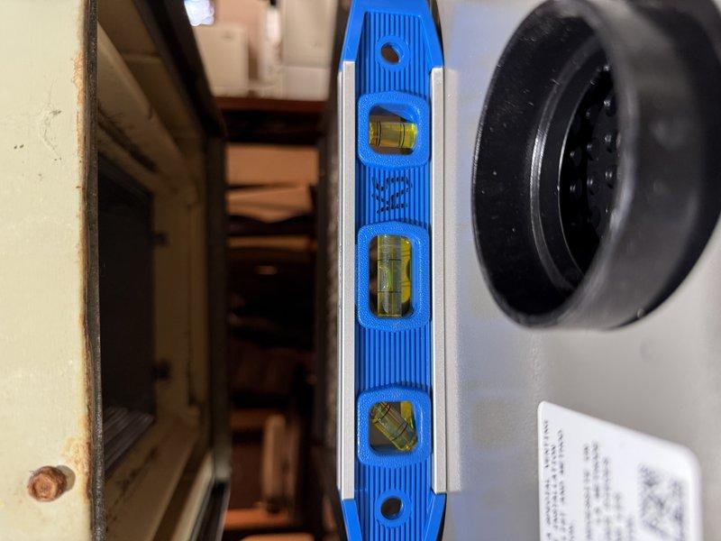 Completed furnace replacement, upgrading from 80% to 90% efficiency model (Lennox EL297E 70K) with new media cabinet. Installed required PVC venting system with dual 18-foot runs positioned tightly along chimney and extended above roofline. Verified proper leveling and system pressure during installation. System is now operational, resolving previous no-heat condition.