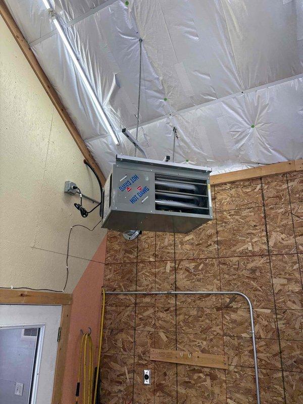 Performed scheduled prepaid maintenance on dual furnace system and Hot Dawg heater. Inspected and serviced all units with no major issues found. Replaced air filters (20x25x4, 14x20x1) and cleaned humidifier. Addressed customer concern regarding insufficient heating in upstairs area; all systems now operating correctly.