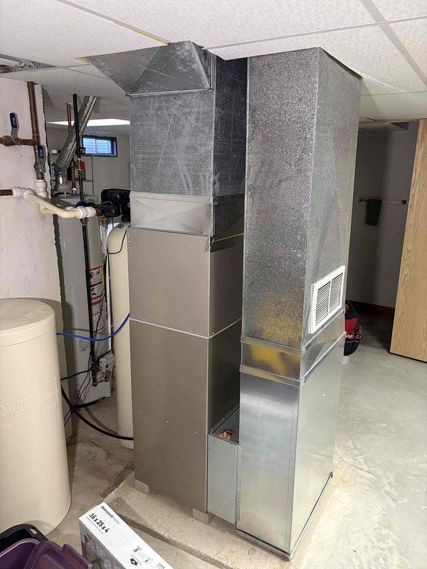 Responded to no-heat complaint and discovered water in the furnace venting system. Performed maintenance by clearing obstructed vent pipes, restoring proper operation. Additionally installed customer-requested Ecobee smart thermostat, replacing existing unit and verifying system functionality after repairs.