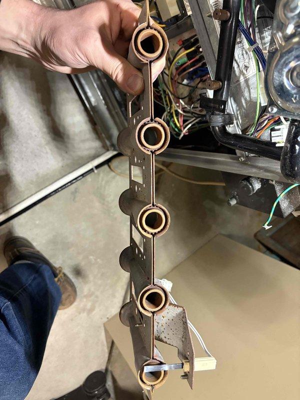 Performed comprehensive furnace tune-up and diagnosed no-heat issue with modine heater in garage. Inspection revealed weakening inducer motor in main system. Presented client with repair options and replacement alternatives after completing service.