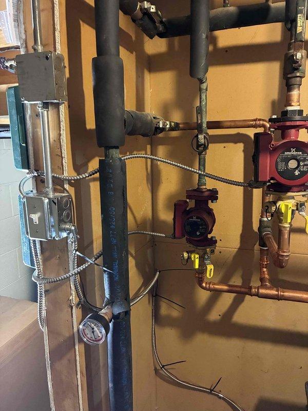 Completed comprehensive repair of improperly wired Burnham boiler system installed by third party. Installed two new zone control panels (Taco) with dedicated temperature loops (140°F and 180°F) and replaced all control wiring to establish proper functionality for the 8-zone heating system. Coordinated with electrician to properly install main line voltage connections and restore system to correct operating specifications.