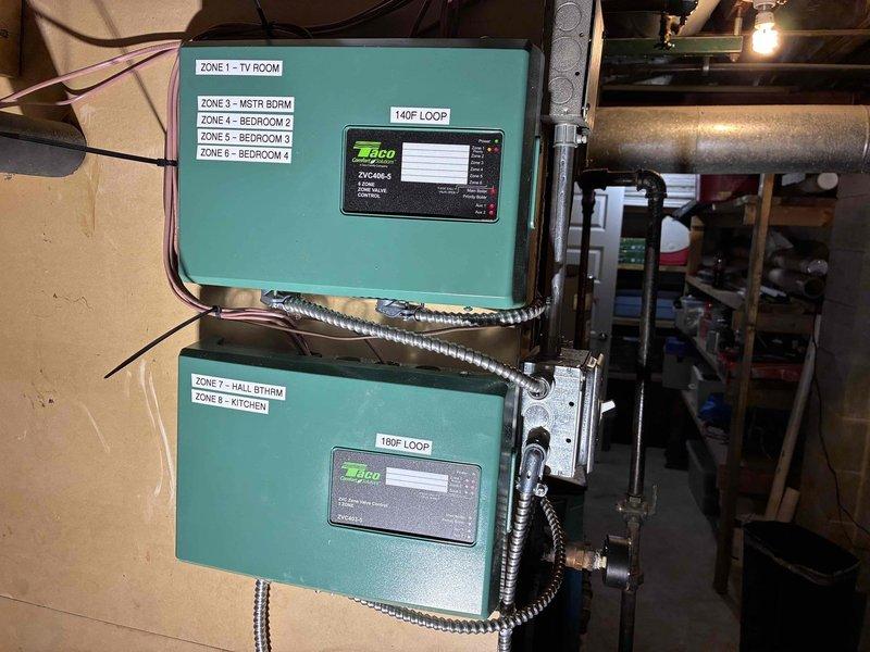 Completed comprehensive repair of improperly wired Burnham boiler system installed by third party. Installed two new zone control panels (Taco) with dedicated temperature loops (140°F and 180°F) and replaced all control wiring to establish proper functionality for the 8-zone heating system. Coordinated with electrician to properly install main line voltage connections and restore system to correct operating specifications.