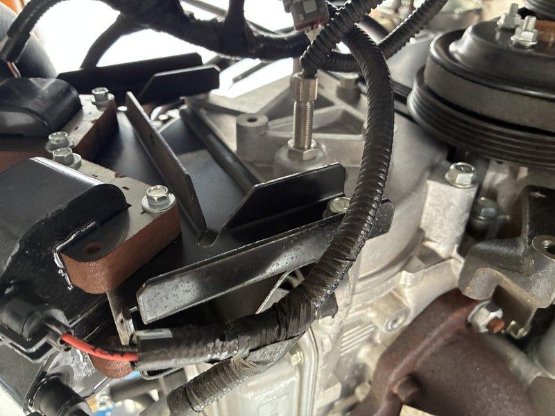 Responded to generator failure after utility power transfer. Diagnosed failed cam sensor as root cause of generator non-start during outage. Documented engine component condition and belt drive system. Ordered replacement part for upcoming repair service.