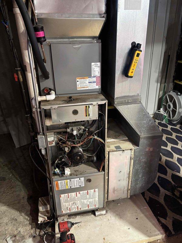 Responded to no heat complaint at tenant Machelle's residence (landlord Michele). Visual inspection revealed failed heat exchangers in aging furnace (10+ years old). System was opened to assess internal components, including blower motor, wiring, and connections. Inspection of basement/utility area also included examination of related ductwork and venting system. Due to safety concerns with failed heat exchangers, recommended complete furnace replacement. Landlord has approved necessary replacement up to pre-approved limit.