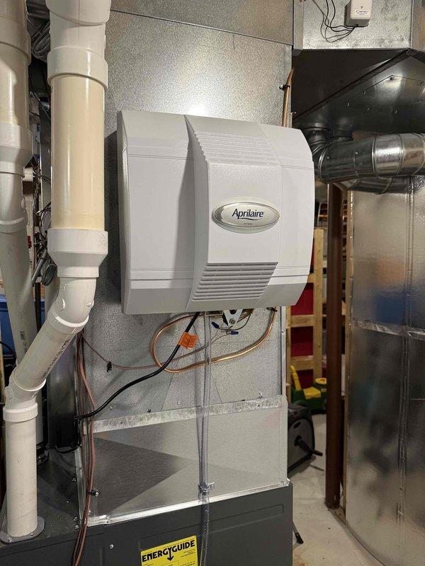 Successfully installed an Aprilaire 700 whole-home humidifier system on the existing HVAC unit. Mounted the humidifier to the ductwork, connected the necessary water supply lines, and installed the digital humidifier control panel with appropriate wiring. System was tested and is functioning properly.