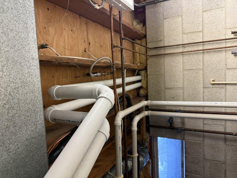 Successfully completed full system installation including EL297V 70K furnace, EL15KC1 2.5 ton condenser, and 30B-71 cased coil with T6 thermostat. Rotated furnace 180 degrees from previous position, installed new 20-foot lineset, added media cabinet, and implemented new PVC venting system for upgraded efficiency (80% to 90%). Coordinated with electrical contractor for general electrical work and modifications required by furnace repositioning.