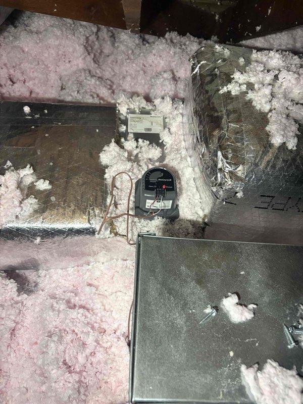 Performed diagnostic inspection on heating system in attic/crawl space area. Identified sensor issue on metal ductwork and inspected system components. Conducted necessary repairs to restore heating functionality and documented with photos of the installation environment and sensor mounting location.