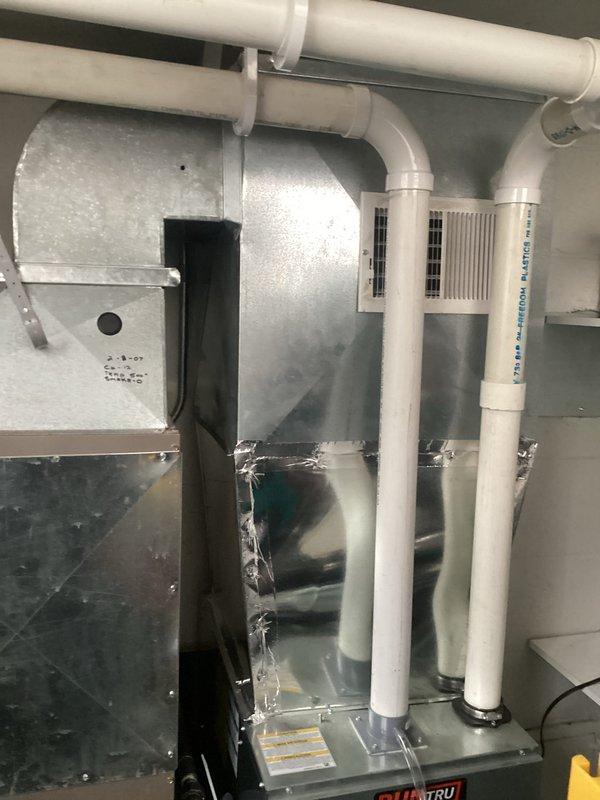 Performed routine cleaning and inspection of the furnace system. Documented existing HVAC configuration with photos of the air handler, ventilation components, and PVC vent piping for future AC installation quote. All systems functioning properly with no issues found.