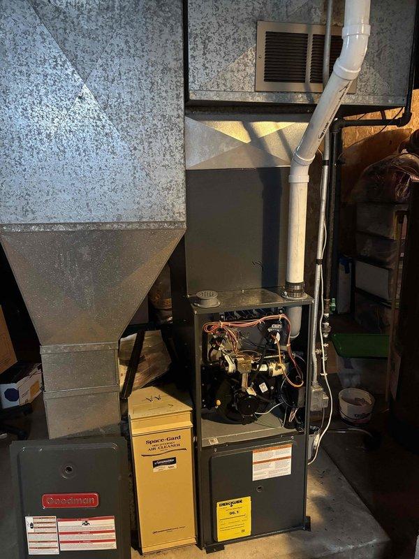 Responded to no heat service call for 10+ year old Goodman furnace system. Diagnosed failed secondary heat exchanger causing unit shutdown. Inspected installation setup in basement including furnace units, ductwork, and venting components. Provided customer with repair and replacement options after comprehensive system evaluation.
