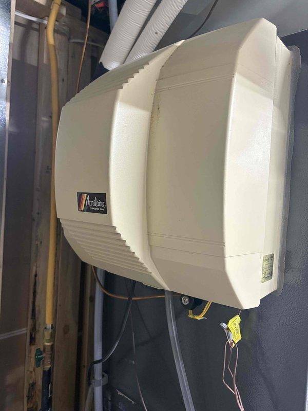 Responded to customer complaint of noise from AprilAire humidifier which was turned off prior to service. Diagnosed failed humidifier unit upon inspection. Provided customer with options for repair and replacement. Discussed Comfort Care Club membership with new homeowner John Kemp, who was previously enrolled at his former residence.