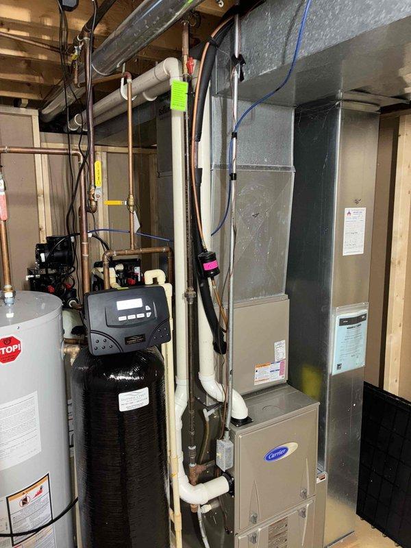 Responded to service call for Carrier furnace with intermittent shutdown issue occurring every 5-6 hours with code 13 indication. Diagnosed flame sensor malfunction causing improper flame detection. Cleaned and repositioned flame sensor, checked ignition sequence, and verified proper operation through multiple test cycles. System now functioning normally with no fault codes.