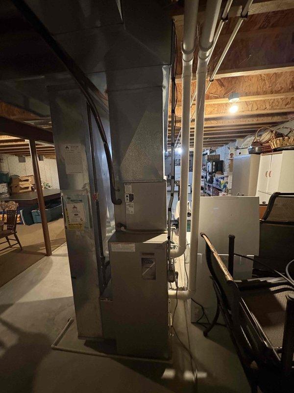 Responded to no heat service call; diagnosed seized blower motor causing burning smell. Presented customer with both repair options for existing furnace and new equipment replacement alternatives.