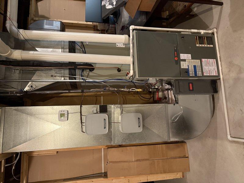 Responded to gas leak concern following CO detector activation and fire department report. Conducted thorough inspection of gas furnace and boiler systems. Found minimal CO levels (13 ppm) within acceptable range; confirmed both heating units operating properly with no carbon monoxide or gas leaks detected at equipment.