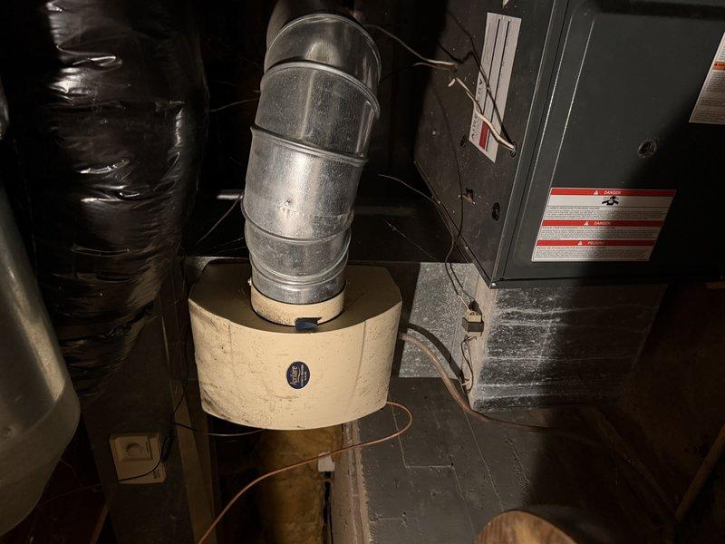 Diagnosed older heating system that was running but not satisfying thermostat due to restricted airflow. Discovered heavily clogged filter impeding proper heat distribution. Replaced filter to restore proper system operation and airflow.