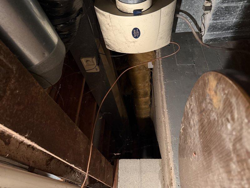 Diagnosed older heating system that was running but not satisfying thermostat due to restricted airflow. Discovered heavily clogged filter impeding proper heat distribution. Replaced filter to restore proper system operation and airflow.