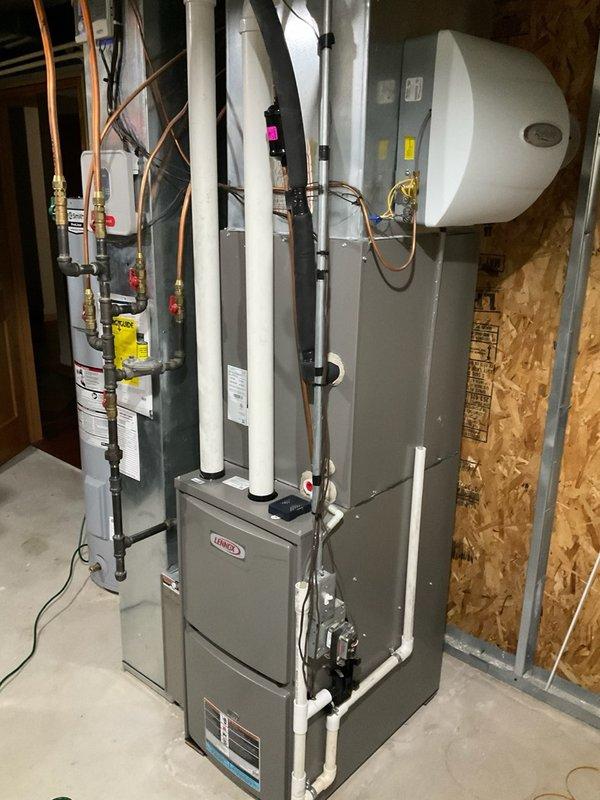 Performed comprehensive tune-up service on Lennox furnace system and inspected the connected Aprilaire humidifier. System was last serviced in 2023. Replaced air filter (16x25x4 - #35) and installed new evaporator pad for air handler. Noted humidifier issue requiring follow-up service at a later date.