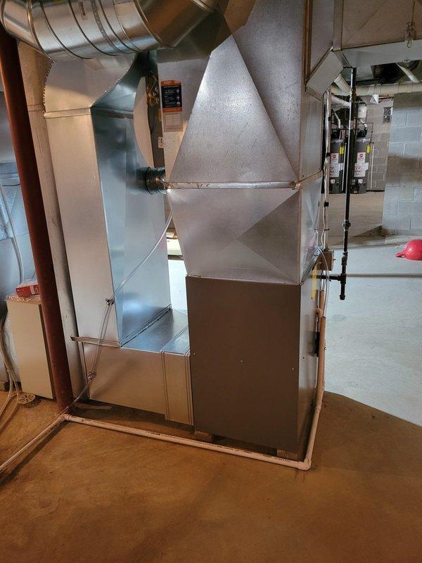 Successfully installed EL297V 90K furnace with enlarged return drop. Connected unit to existing 3" PVC venting (40') and integrated with customer's existing zoning system. All components leveled, properly secured, and tested for optimal functionality.