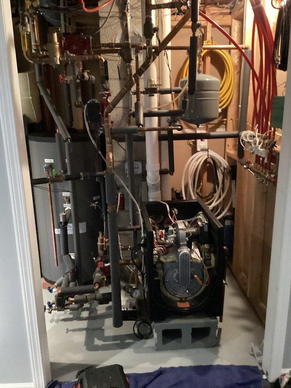 Performed tune-up service on 10-year-old Munchin boiler. Diagnosed error codes F9 and F11, revealing failing heat exchanger. Customer advised on system condition and provided quote for replacement unit.