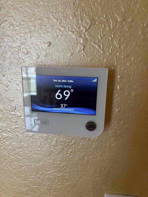 Completed scheduled furnace tune-up service on Carrier system. Performed comprehensive maintenance including installation of new filter, replacement of drain hose, and UV bulb replacement. System functioning properly with all components in good operating condition.