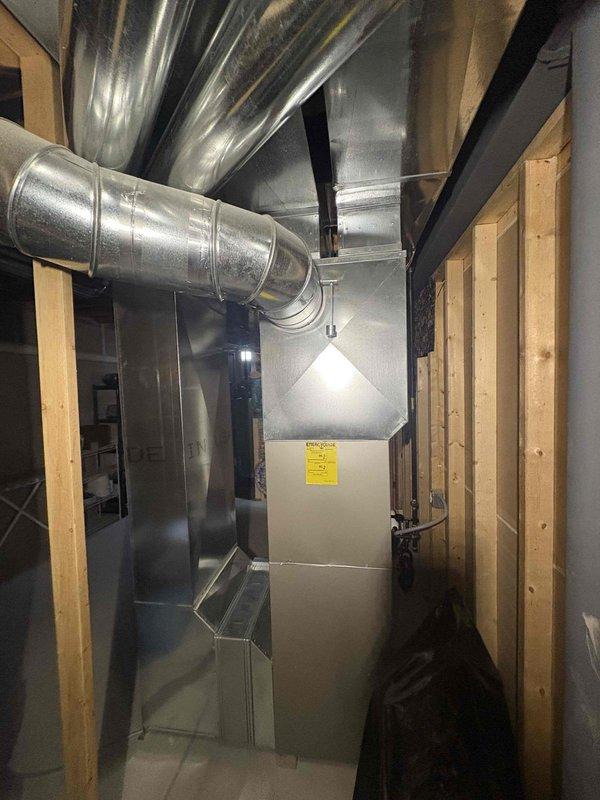 Responded to no heat call for a Carrier furnace system. Diagnosed faulty inducer motor with water accumulation causing system failure. Removed water from inducer motor which restored proper operation. System functioning normally after service.