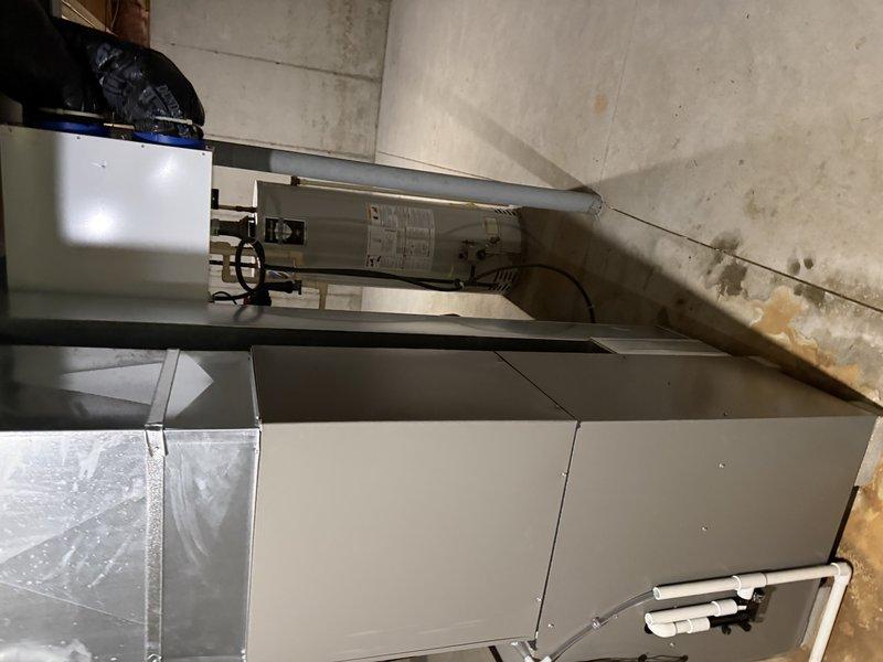 Successfully installed an EL297V 70K furnace and 30B coil in customer's basement, including a new media cabinet and return drop, while replacing the cellular core PVC. Reused the existing Nest thermostat and prepared for future installation of EL15KC1 2.5 ton AC unit, which will utilize the existing brackets with a new pad.