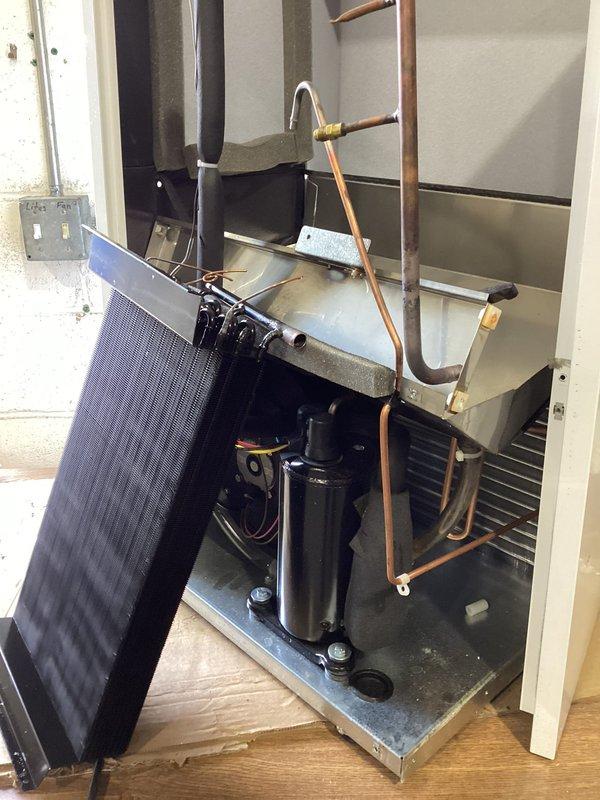 Responded to service call for inoperative HVAC unit (S#: J2096733). Diagnostic inspection revealed refrigerant leak at evaporator coil resulting in complete loss of refrigerant charge. Replaced failed coil assembly and restored proper system operation with factory-specified refrigerant charge.