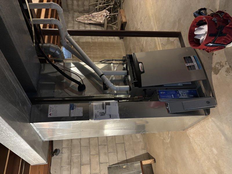 Performed annual furnace clean and check maintenance service on residential unit with 16x25x4 filter. Inspected entire system including furnace cabinet, ductwork, ventilation components, and PVC drainage/venting. All systems functioning properly with no issues identified at this time. Recommended continuing regular maintenance schedule.