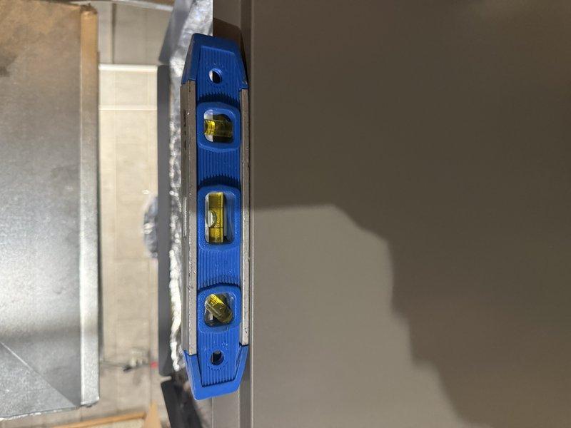 Completed installation of complete HVAC system including EL297V 45K furnace and EL15KC1 1.5 Ton condenser with 24B coil. Verified proper level positioning of equipment using spirit level. Retained customer's existing Ecobee thermostat per installation specifications.