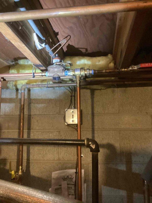 Performed annual maintenance service on Crown boiler system. All components inspected including gas valve assembly, copper piping network, and red circulator pumps. System operating within manufacturer specifications; no issues identified during maintenance procedure.