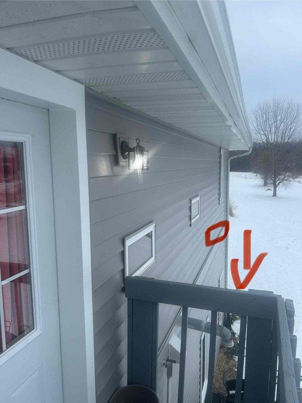 Performed inspection of electrical system after siding installation where contractor had removed and reinstalled light fixtures. Identified exterior wall fixture with continuous operation and inspected main electrical panel, noting code compliance issues. Marked problematic circuit breaker in panel for further attention and evaluated exterior connections affected by the recent siding work.