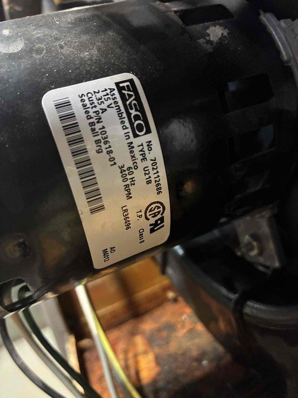Responded to service call for furnace exhibiting vibration noise with water intrusion. Inspection revealed a worn FASCO motor (type 70-23486-86) requiring replacement. Also identified and repaired corroded fittings at water connection point to eliminate leakage and prevent future damage.