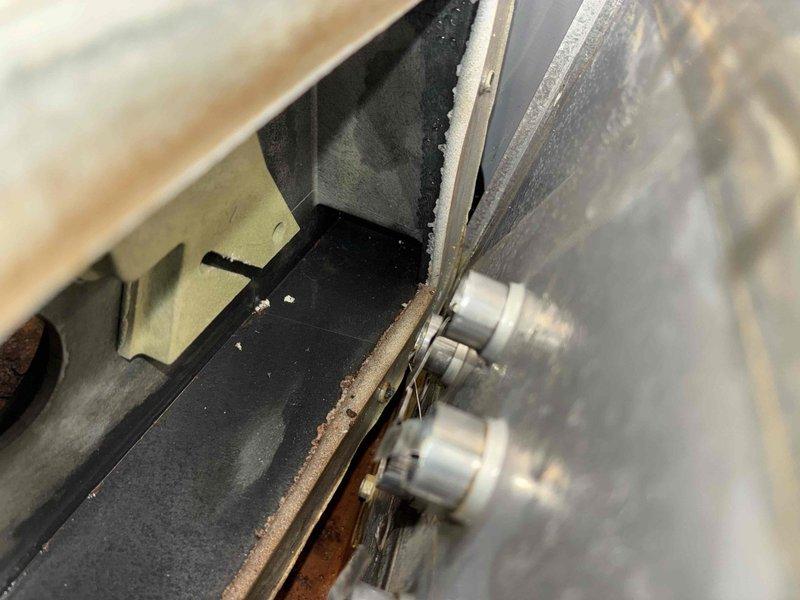 Responded to service call for furnace exhibiting vibration noise with water intrusion. Inspection revealed a worn FASCO motor (type 70-23486-86) requiring replacement. Also identified and repaired corroded fittings at water connection point to eliminate leakage and prevent future damage.