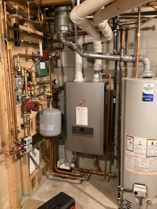 Performed routine maintenance on 1-year-old NTI boiler system for new customer. Inspected circulation pump, valves, and electrical components for proper operation. Verified tankless water heater connections and expansion tank functionality. System operating within normal parameters.