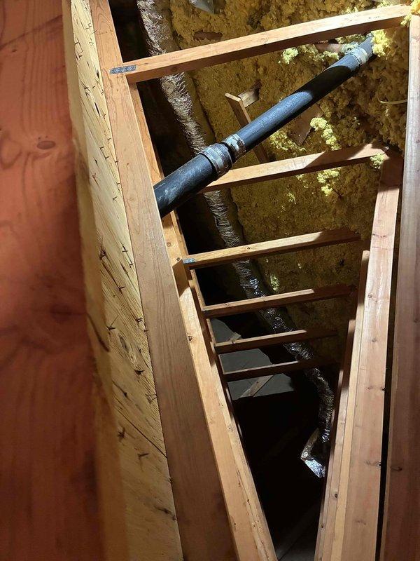 Completed installation of a bathroom ventilation system, which included routing insulated ductwork through the wall cavity and connecting to the exhaust pipe. Ensured proper sealing at connection points with foil tape and verified the system was ready for electrical hookup by the customer's electrician.