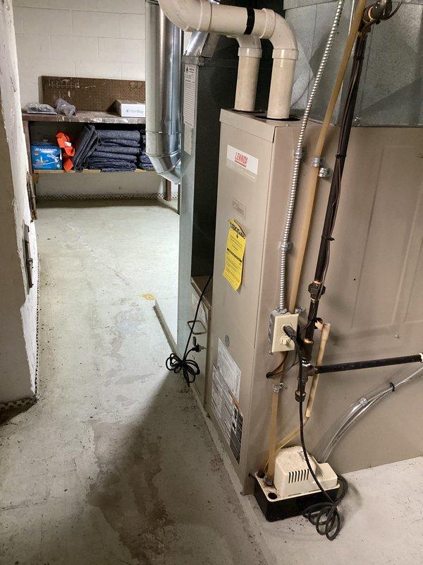 Performed monthly maintenance service on Lennox X6664 furnace under CCC Quality Plan. Completed regular cleaning with thorough inspection of unit and connected ductwork in basement utility area. System is functioning properly with no issues detected.