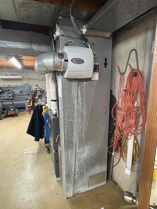 Performed complete clean and check on large Goodman furnace system. Installed new AprilAire humidifier with replacement pad and drain hose. Customer enrolled in Comfort Care Club maintenance agreement. All equipment operational and functioning within specifications.