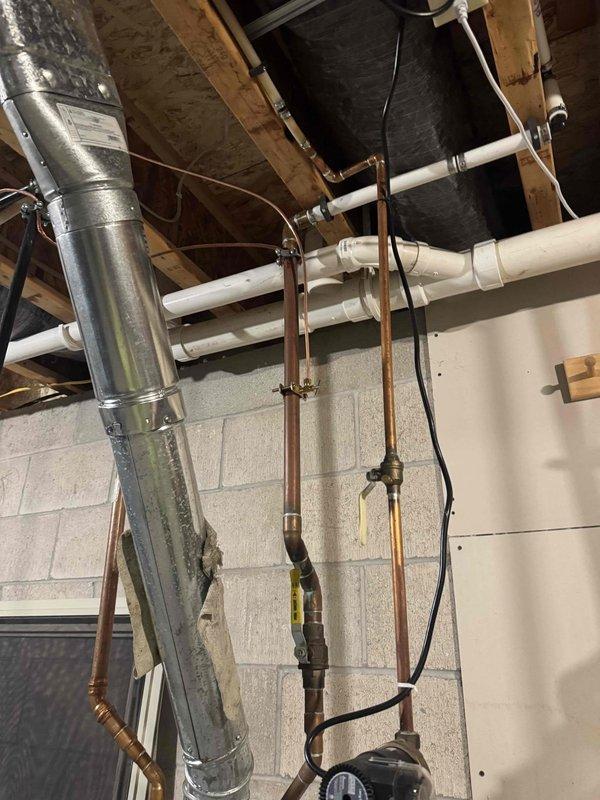 Performed complete annual furnace tune-up on 2006 model, including inspection of heat exchanger, flame sensor, igniter, inducer motor, blower motor, burners, venting, safety limits, and gas operation. Cleaned blower compartment, drain trap, and replaced all drain hoses. System testing confirmed proper operation with readings: inducer amp 0.49, gas pressure 1.7/3.4, blower amps 6.96, HSI ohms 64.7, return temp 73°F, supply temp 121°F, heat rise 48°F, and CO level 19.