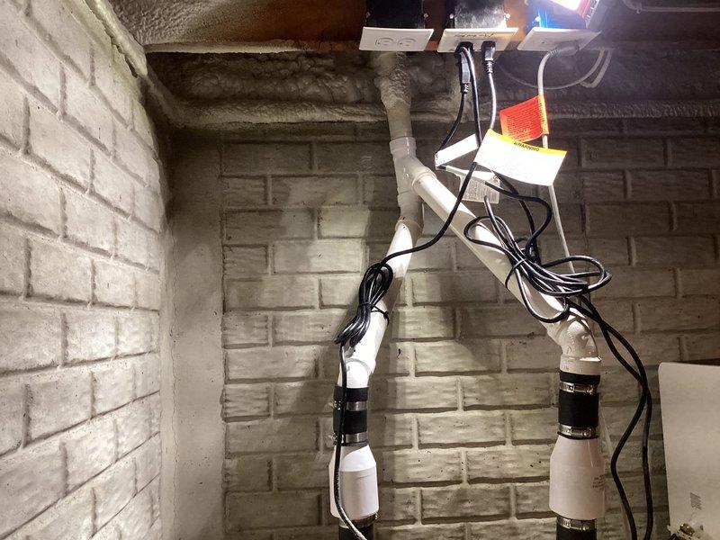 Successfully installed a secondary sump pump system in customer's basement, adding a Jim Murray EC-MAN submersible pump with remote float switch. Ran a dedicated 15-amp circuit from the generator panel to power the new pump installation. Mounted two quiet check valves to complete the water management system, ensuring proper drainage and backup protection.