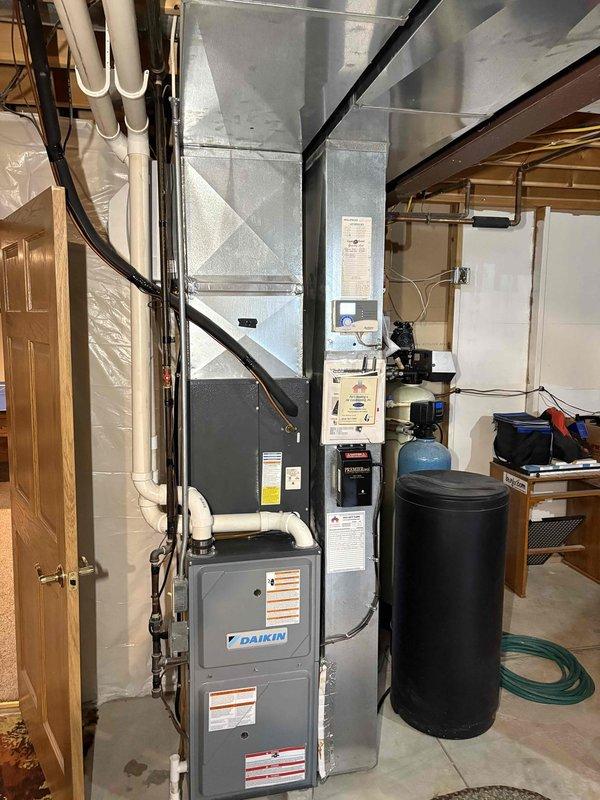 Performed annual furnace maintenance including installation of new 16x25x1 filter and replacement of door safety switch. Inspected Daikin furnace system with Aprilaire humidifier and verified proper operation of all components. System is now operating correctly with all safety features functional.