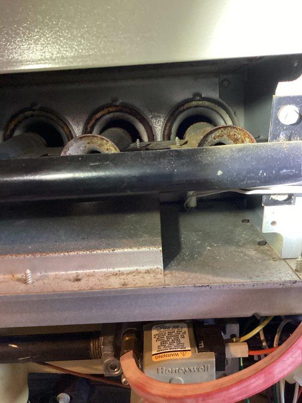 Performed scheduled maintenance on a 2006 furnace under CCC Premium Plan. Completed regular cleaning and 16X25X4 filter service. Noted significant rust on burners and heat exchanger components that warrant attention. Discussed condition with owner regarding potential future maintenance needs.