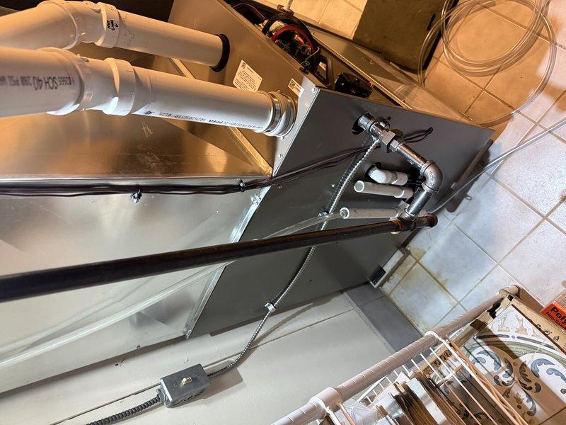 Successfully installed a Lennox SLP99 90K BTU furnace in basement location, along with S40 thermostat and associated PVC venting. Reused existing return drop and filter cabinet while ensuring proper leveling of all components. System was properly connected to electrical panel with appropriate circuit protection.