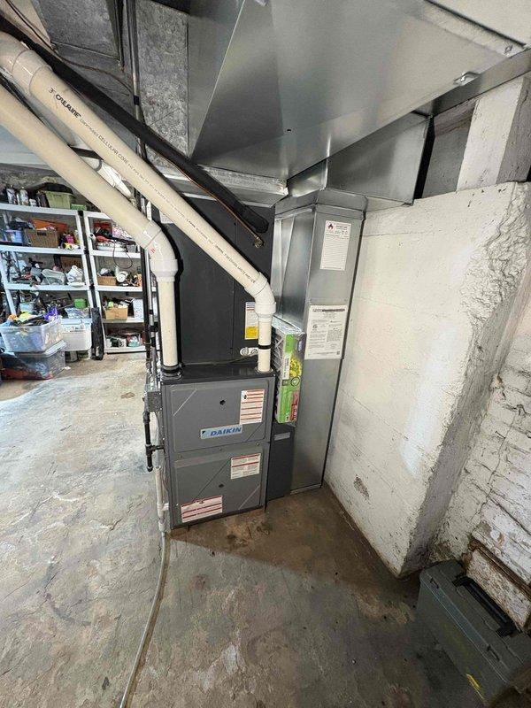 Responded to service call for LP furnace struggling to maintain temperature. Performed comprehensive tune-up on Daikin furnace system, including inspection of ductwork connections, PVC venting, and condensate lines. Verified proper operation of furnace and resolved performance issues as requested by customer. Customer enrolled in Comfort Care Club maintenance program.