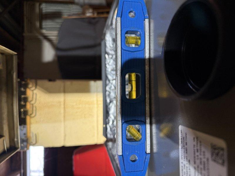 Installed Lennox ML296V 45K BTU high-efficiency furnace to replace existing unit. Added secondary 2" PVC pipe for proper venting configuration, reusing existing cellular core pipe for intake. Verified electrical requirements and noted shared circuit status for future dedicated circuit installation. Removed indoor AC coil as requested and confirmed non-operational status of outdoor condensing unit. System properly leveled and tested for operation.