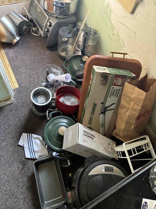 Performed diagnostic assessment on an aging furnace system (10+ years old) in basement utility area exhibiting no-heat condition. Identified significant wear and corrosion on critical components. Completed cleaning of burner assembly, replaced faulty ignitor, and restored system functionality after verifying proper combustion and heat cycle operation.