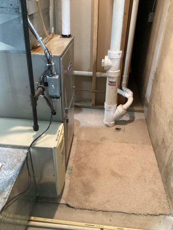 Completed annual maintenance on LG furnace under CCC Quality Plan agreement #413 #35. Performed regular cleaning and inspection; system is functioning properly with no issues identified. Photos taken of the furnace installation including the Aprilaire humidifier and associated ductwork in the mechanical room.