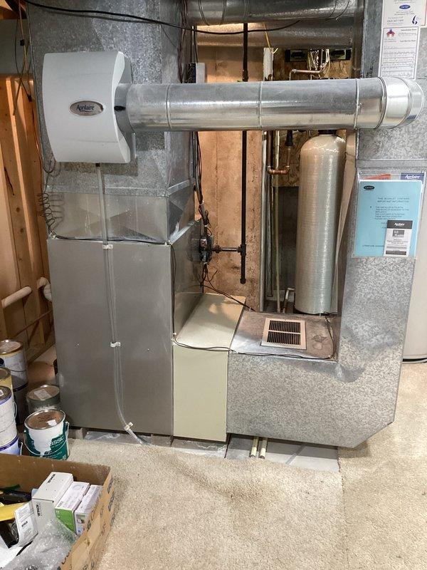 Completed annual maintenance on LG furnace under CCC Quality Plan agreement #413 #35. Performed regular cleaning and inspection; system is functioning properly with no issues identified. Photos taken of the furnace installation including the Aprilaire humidifier and associated ductwork in the mechanical room.